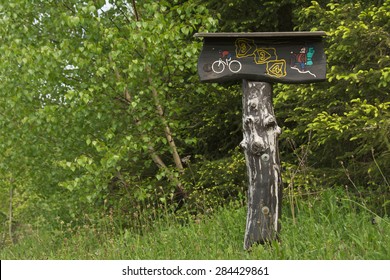 Mountain Bike And Hiking Trail Signpost, 
Made Of Wood
