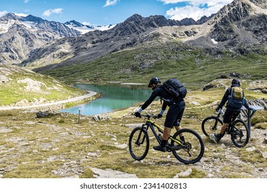 Mountain bike scene on the Italian alps of Valtellina - Shutterstock ID 2341402813
