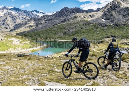 Mountain bike scene on the Italian alps of Valtellina