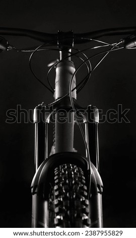 Mountain Bike Suspension Fork on Dark Background, Studio Shot