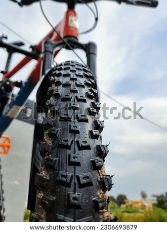 Mountain bike tire closeup. Mountain bike wheel close up.
