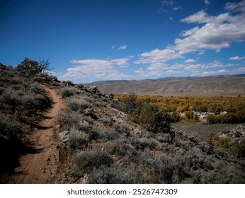 Mountain bike trail on hillside of sage brush in Gunnison Colorado in Hartman Rocks Recreation Area - Powered by Shutterstock