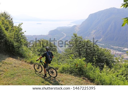 Mountain biker on the Lake Maggiore (Lago Maggiore)