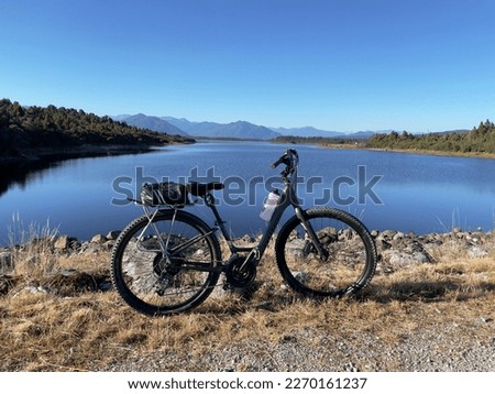 Mountain biking along the west coast wilderness trail in New Zealand
