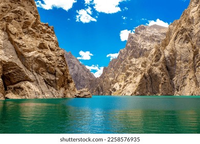 Mountain blue lake among the rocks. Beautiful landscape. Wonderful nature. Long banner, panoramic view - Shutterstock ID 2258576935