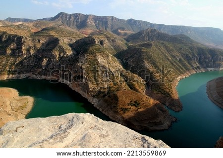 A mountain canyon and the Botan River (a tributary of the Tigris River) in a national park near the city of Siirt in the Southeast Anatolia region of Turkey Stock photo © 