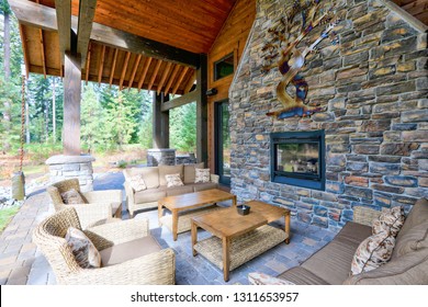 Mountain Cedar Home With Rustic Exterior Details And Rainy Late Fall Daylight.