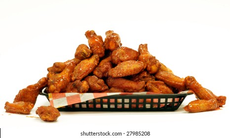 A mountain of Chicken Wings on a tray.