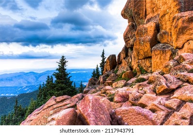 Mountain cliff among the rocks. Mountain cliff view. Red rocks in mountains. Red cliff mountain