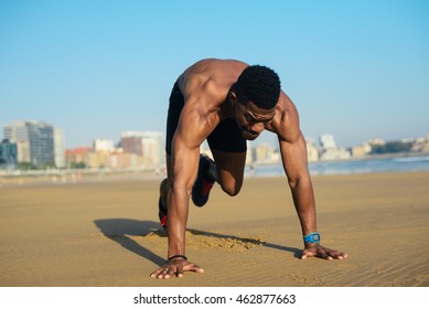 Mountain Climbers Exercise. Fit Man Warming Up Before Running At The Beach. Black Athlete On Hiit Cardio Outdoor Workout.