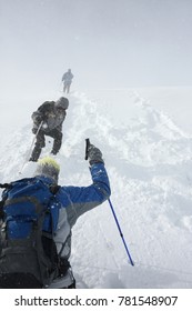 Mountain Climbers In A Snow Storm