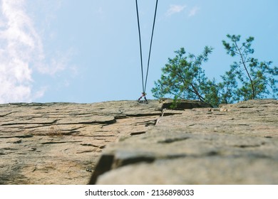 Mountain Climbing Wall. Training Area For Outdoor Activities. No People. Blue Sky.