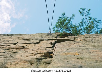 Mountain Climbing Wall. Training Area For Outdoor Activities. No People. Blue Sky.