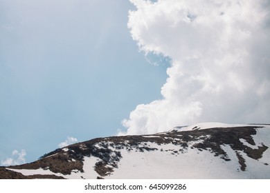 Mountain in clouds.	