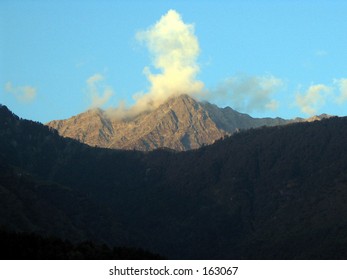 Mountain covered by clouds