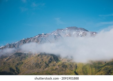 mountain  is covered by clouds 