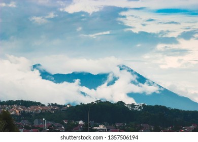 the mountain is covered in clouds