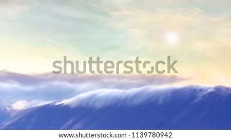 Mountain covered with clouds.