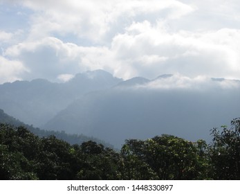 Mountain covered with dense clouds. 