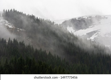 Mountain covered in storm clouds