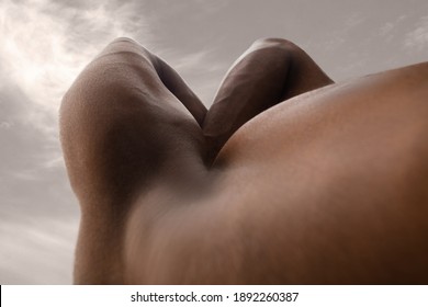 Mountain. Detailed Texture Of Human Skin. Close Up Of Young African-american Male Body Surface Like Landscape With The Sky On Background. Skincare, Bodycare, Healthcare, Inspiration, Fantasy Artwork.