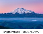 Mountain Elbrus in the early morning just before the sunrise with vibrant sky