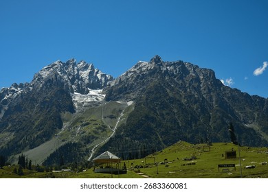 A mountain is an elevated portion of the Earth's crust, generally with steep sides that show significant exposed bedrock. Although definitions vary, a mountain may differ from a plateau