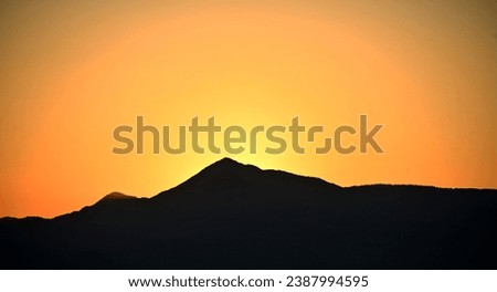 Mountain fantom at the sunset