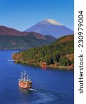 Mountain Fuji and Lake Ashi or Ashinoko with Hakone temple and sightseeing cruise boat in autumn