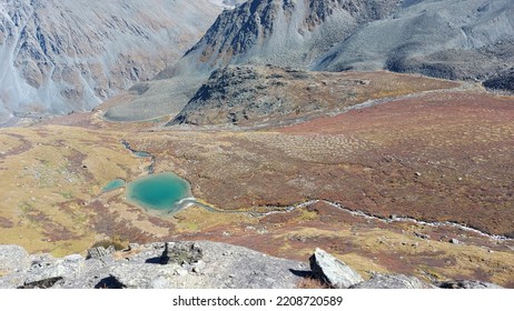 Mountain Glacier Lake. Picturesque Hidden Location In The Mountains. Outdoors Style Vacation. Adventure Travel In The Wildlife, No People. Mountain Valley Landscape Aerial View Stock Photo