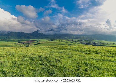 Mountain green valley and cloudy sky.Pasture in mountain valley.Mountain landscape.Natural background. - Shutterstock ID 2165627951