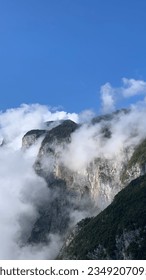 A mountain hidden by clouds.