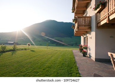 Mountain House At Sunset. Dolomites, Italy.