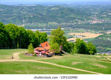 Mountain Hut In European Alps On Ski Slope In Summer, Hiking Destination, Koca Luka On Mariborsko Pohorje Near Maribor, Slovenia