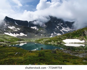 Mountain lake with clouds