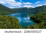 Mountain lake greenery landscape. View of a beautiful mountain lake. 