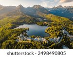 Mountain lake Strbske pleso. Strbske lake with view of the High Tatras National Park, Slovakia