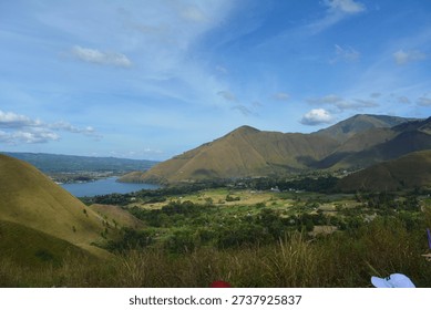Mountain lake view under dramatic cloudy sky landscape