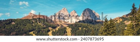 Mountain landscape background. Mount Langkofel. Dolomite Alps in South Tyrol. Selva di Val Gardena, Bolzano, Italy, Europe. Horizontal banner