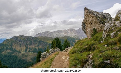 a mountain landscape with clouds