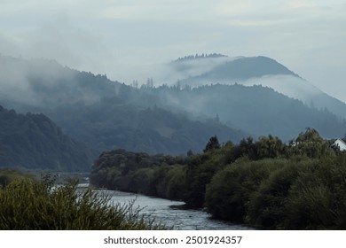 Mountain landscape with clouds and fog, Carpathians - Powered by Shutterstock