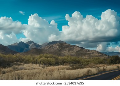 Mountain Landscape with Dramatic Clouds and Desert Road - Powered by Shutterstock