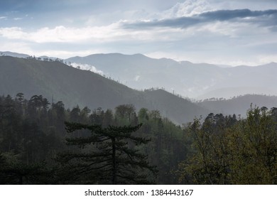 mountain landscape with a dramatic stormy sky