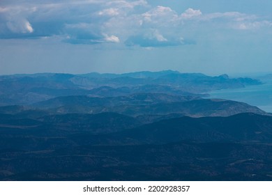 Mountain Landscape, Forested Mountains And Blue Sea, Top View.