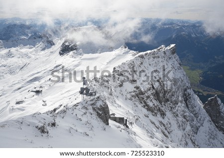 Similar – Image, Stock Photo Hikers climbing the Zugspitze