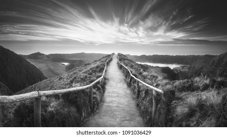 Mountain landscape with hiking trail and view of beautiful lakes Ponta Delgada, Sao Miguel Island, Azores, Portugal. . Black and white concept - Powered by Shutterstock