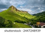 Mountain landscape at Honey Waterfalls canyon near Kislovodsk, Russia. View of scenic green forest and sky in Russian Kavkaz in summer. Concept of nature, travel, tourism in Caucasian Mineral Waters.