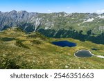 
mountain landscape with lakes and meadows