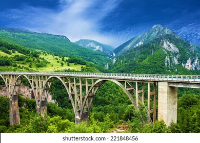 Mountain landscape, Montenegro. Durdevica Tara arc bridge in the mountains, One of the highest automobile bridges in Europe. - Powered by Shutterstock