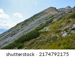 Mountain landscape with sheer stone rocky slopes of High Tatra Mountains, Slovakia
